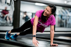 Wheaton Sport Center woman doing a side plank