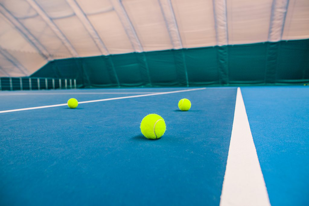 Wheaton Sport Center tennis balls on a tennis court