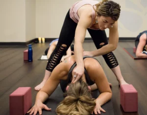 Wheaton Sport Center woman yoga stretch