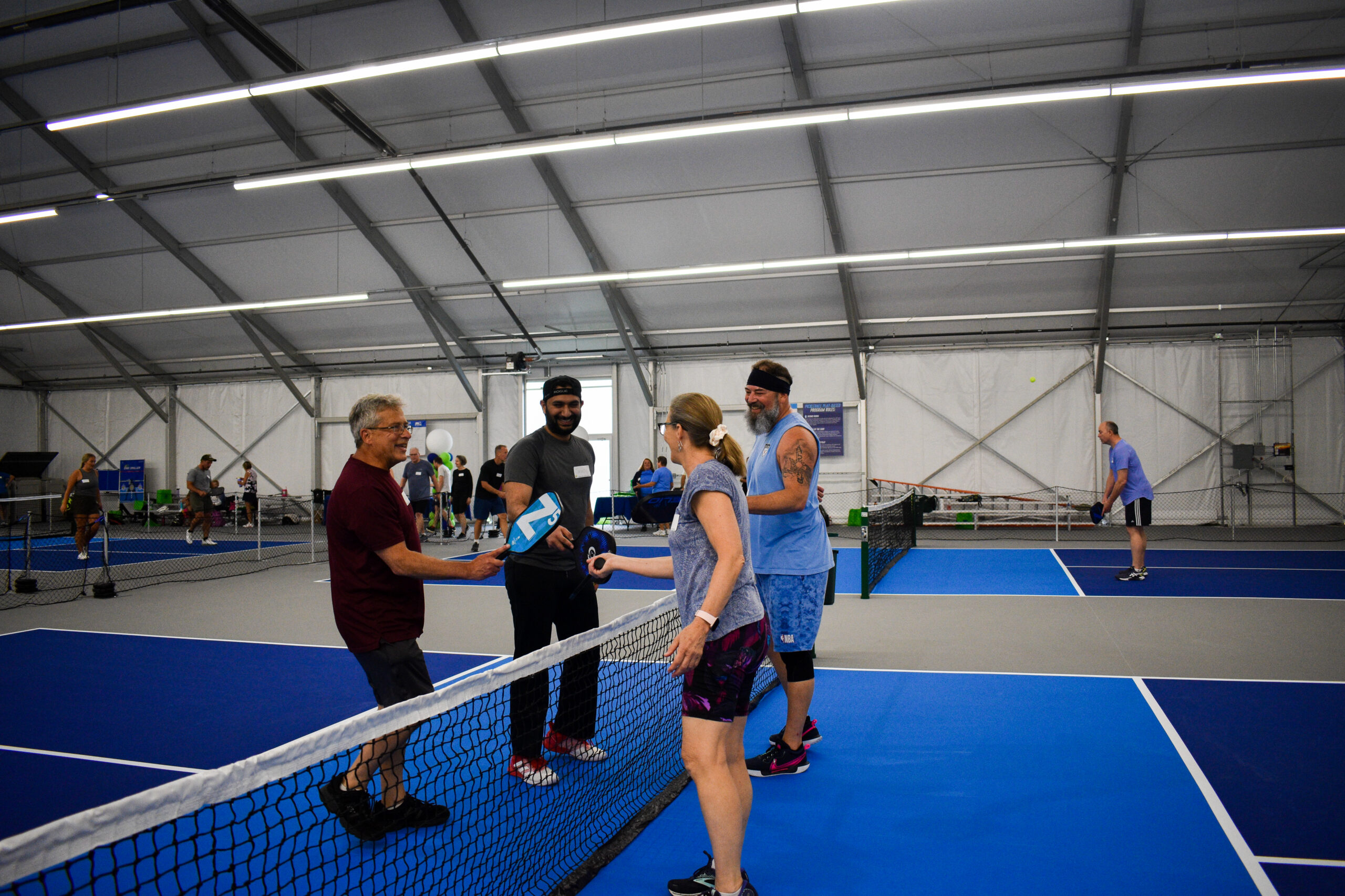Wheaton Sport Center people playing pickleball in new Pickleball Pavilion