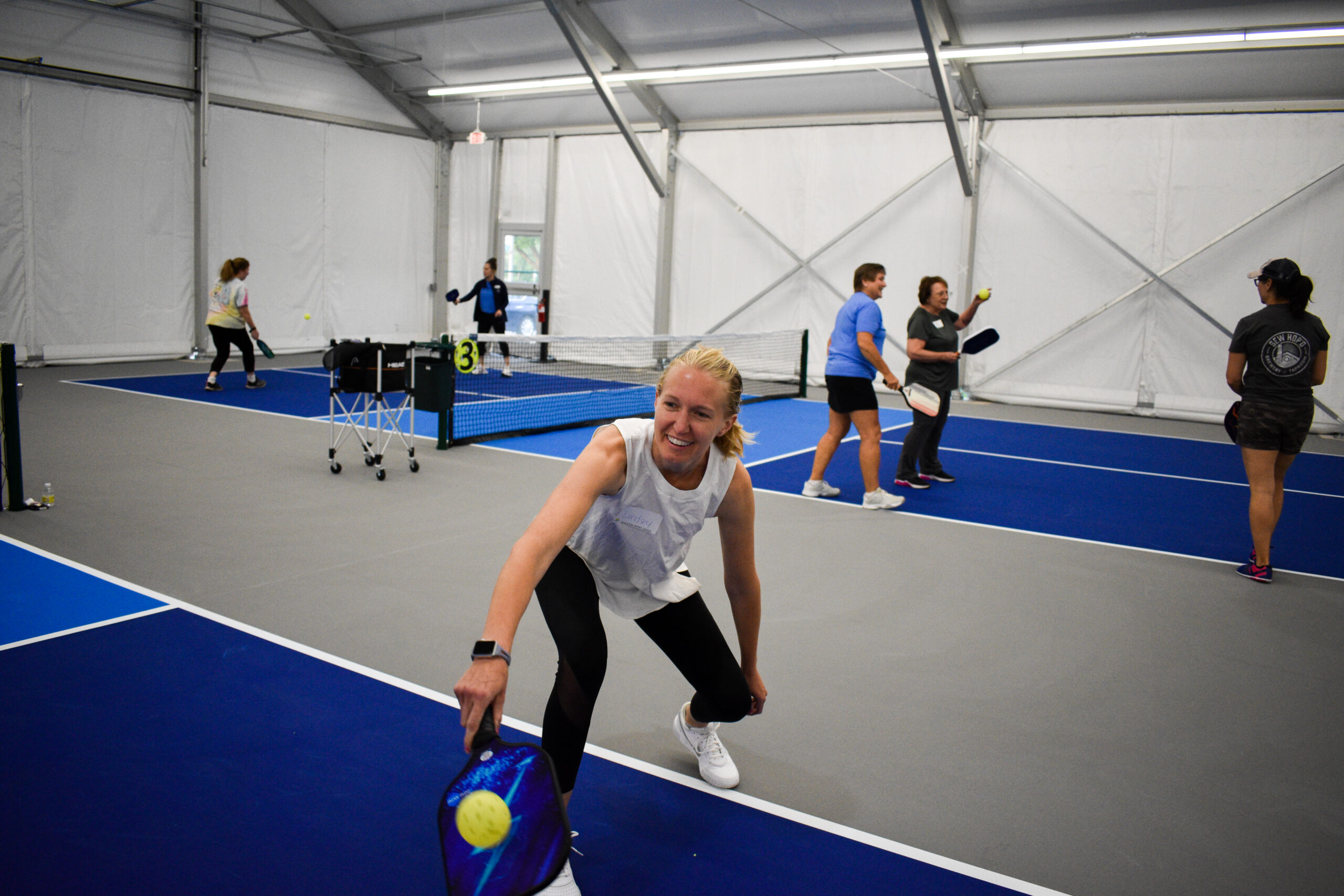 Wheaton Sport Center people playing pickleball in new Pickleball Pavilion